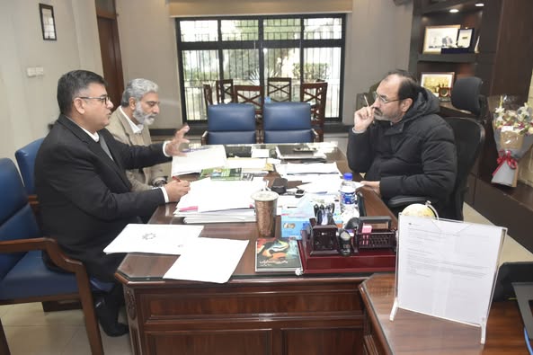 Vice Chancellor UET Prof. Dr. Shahid Munir (TI) is in a meeting with Project Director Engr. Asad Masood and Director Planning and Development Prof. Dr. Rashid Hameed.